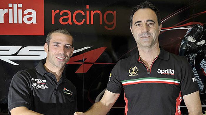 Melandri (αριστερά) και Albesiano σφίγγουν τα χέρια στην πρώτη επίσημη εμφάνισή τους.