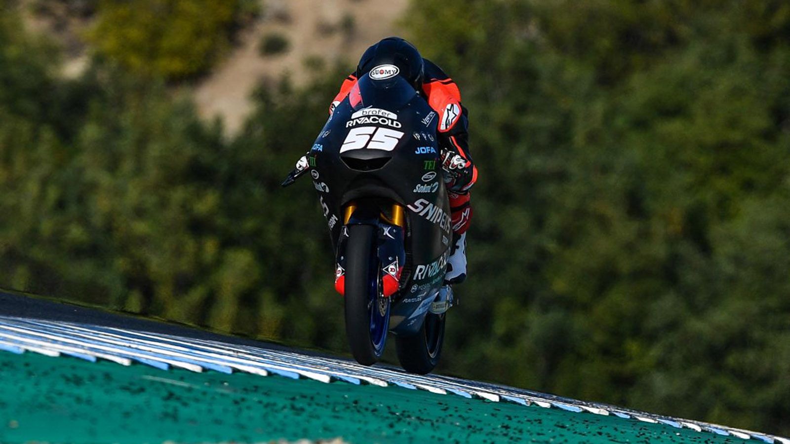 Ο Romano Fenati οδηγώντας την Moto3 μοτοσυκλέτα του. 