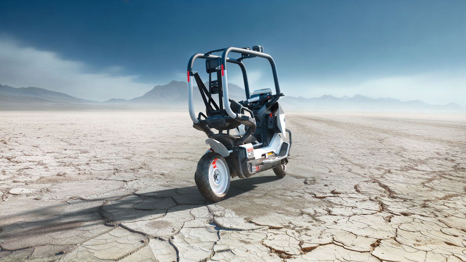 Η ιδέα δεν είναι εντελώς καινούρια. Πριν από 25 χρόνια, η BMW παρουσίασε το C1 Concept, μια προσπάθεια να προσφέρει ασφάλεια χωρίς κράνος στις πόλεις.