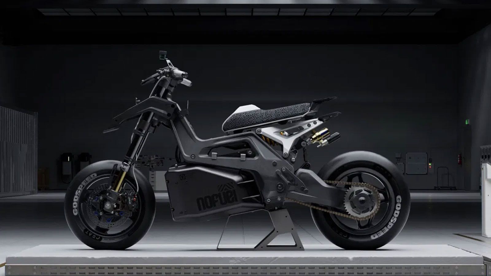 Ηλεκτρική μοτοσυκλέτα μαύρη σε μαύρο φόντο.