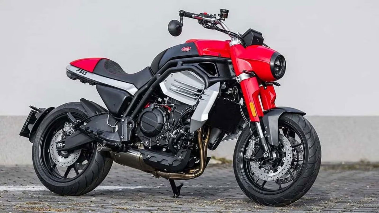 Μοτοσυκλέτα κόκκινη με ρετρό σχεδίαση εμπνευσμένη από τις δίχρονες Jawa 350.